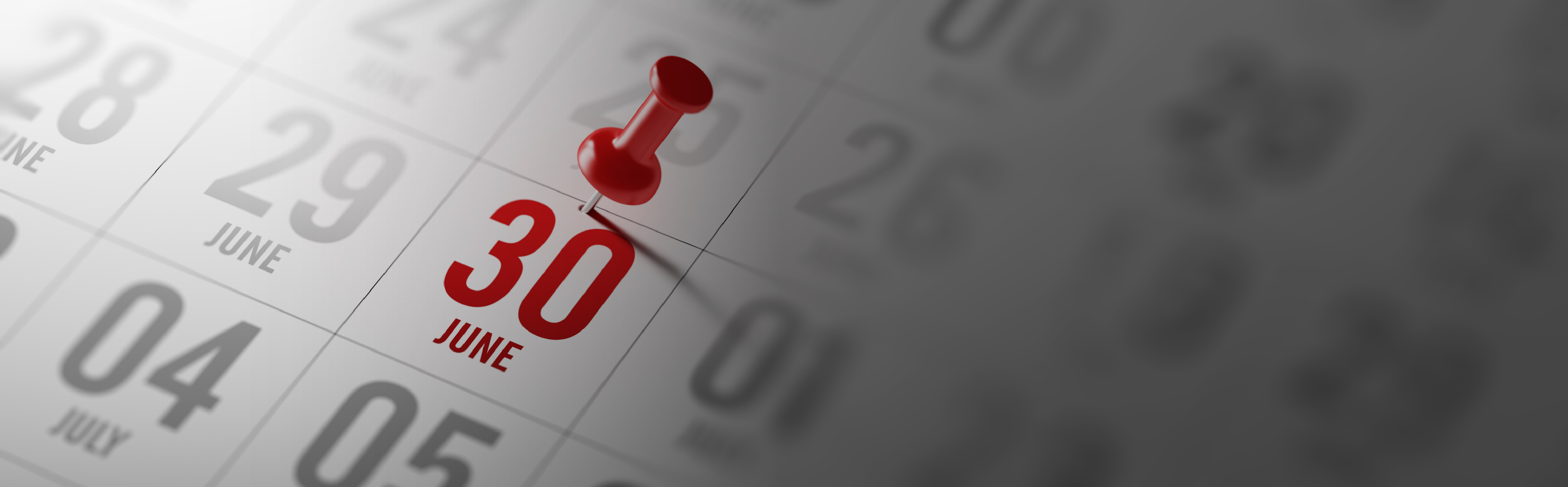 immagine che raffigura una puntina da disegno rossa che fissa la data del 30 giugno in colore rosso su un calendario 